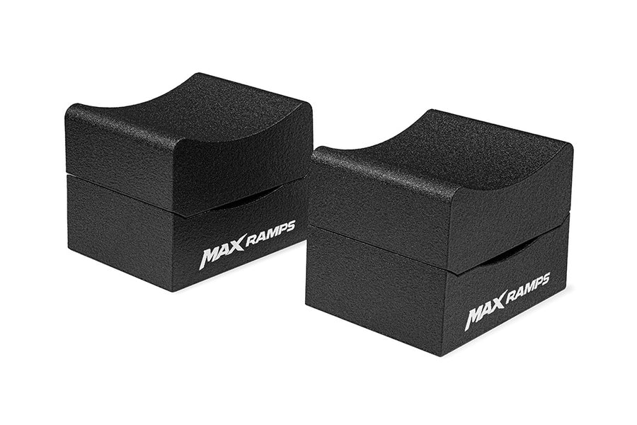 Two black MAXRAMPS foam support blocks with white logo branding, shown on a clean white background.
