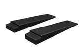 Two black incline ramps for tilt-bed trailers on a white background.