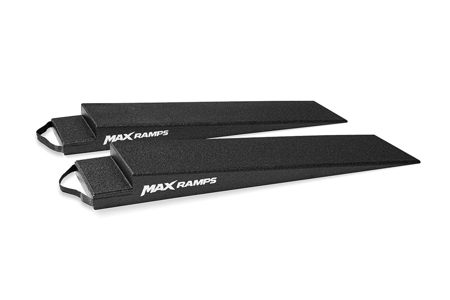 Two black MAX RAMPS vehicle ramps with white logo branding, displayed on a clean white background.