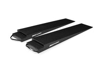 Two black textured MAXRAMPS vehicle ramps with white logo branding, shown on a clean white background.